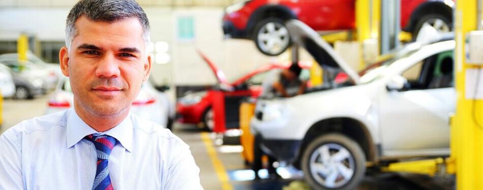 Man in car service department Man in car service department