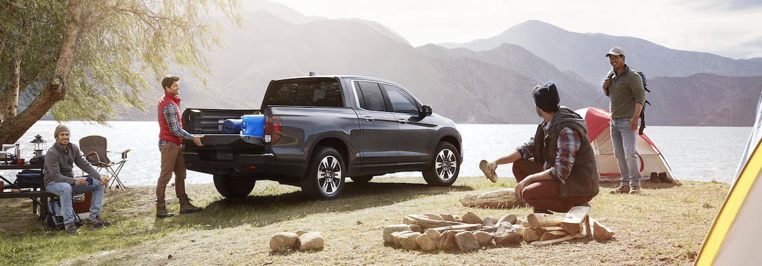 Honda Ridgeline parked at a campground