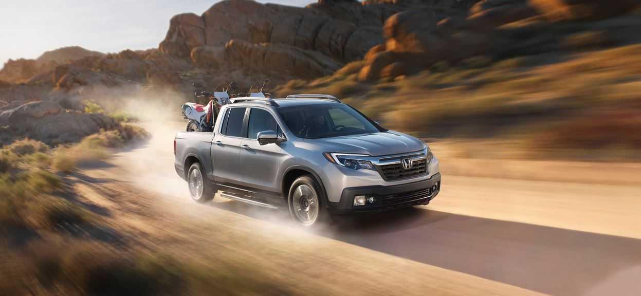 Honda Ridgeline driving through the desert
