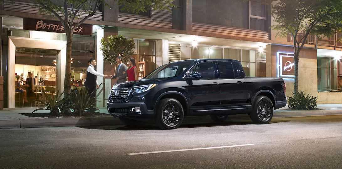 Honda Ridgeline parked in front of an Austin, TX restaurant