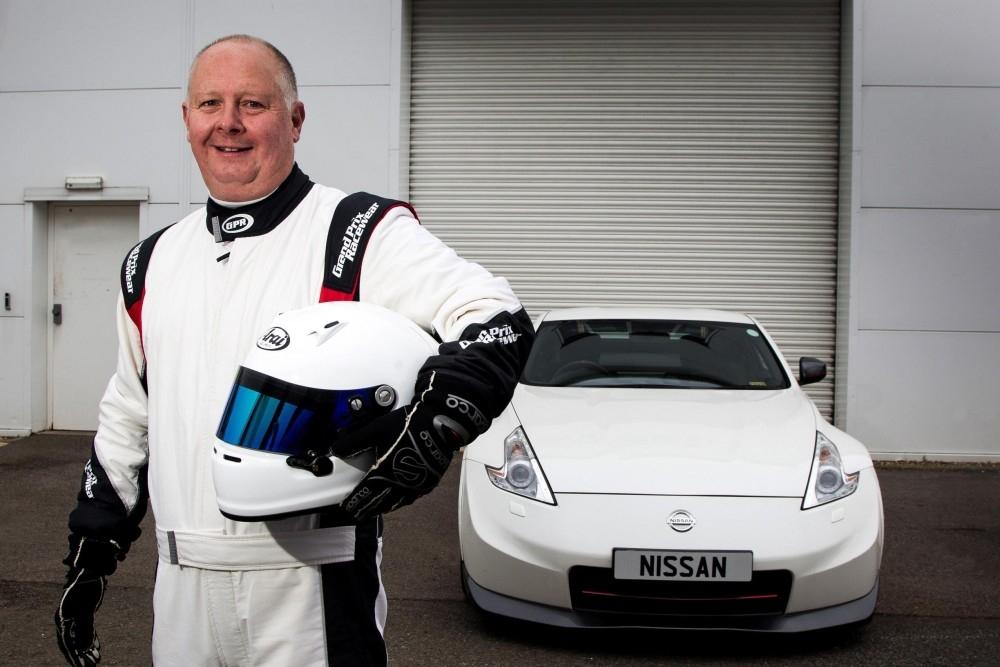 Helmet Comes Off Nissan’s Racing Driver Helmet Comes Off Nissan’s Racing Driver