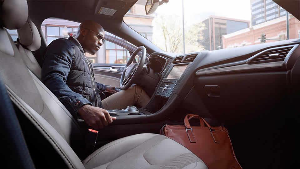 2017 Ford Fusion V6 Sport shown with leather-trimmed seats 2017 Ford Fusion V6 Sport shown with leather-trimmed seats, Miko suede inserts in Dark Earth Grey