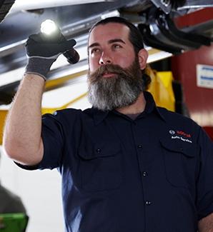 Bosch Auto Service technician performing a DVX which comes with every service