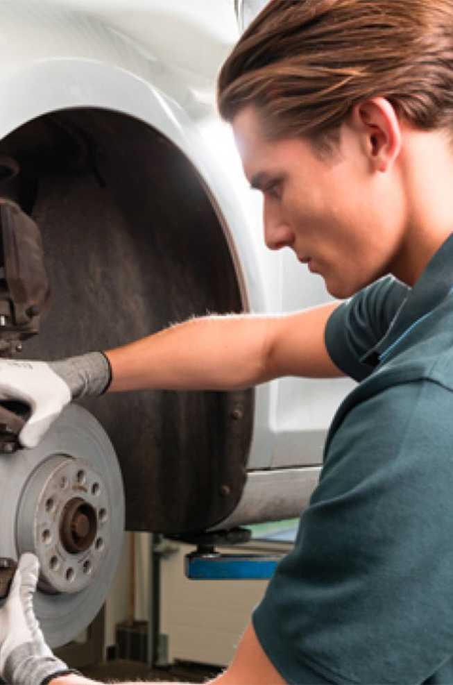 Bosch Auto Service brake technician replacing a rotor