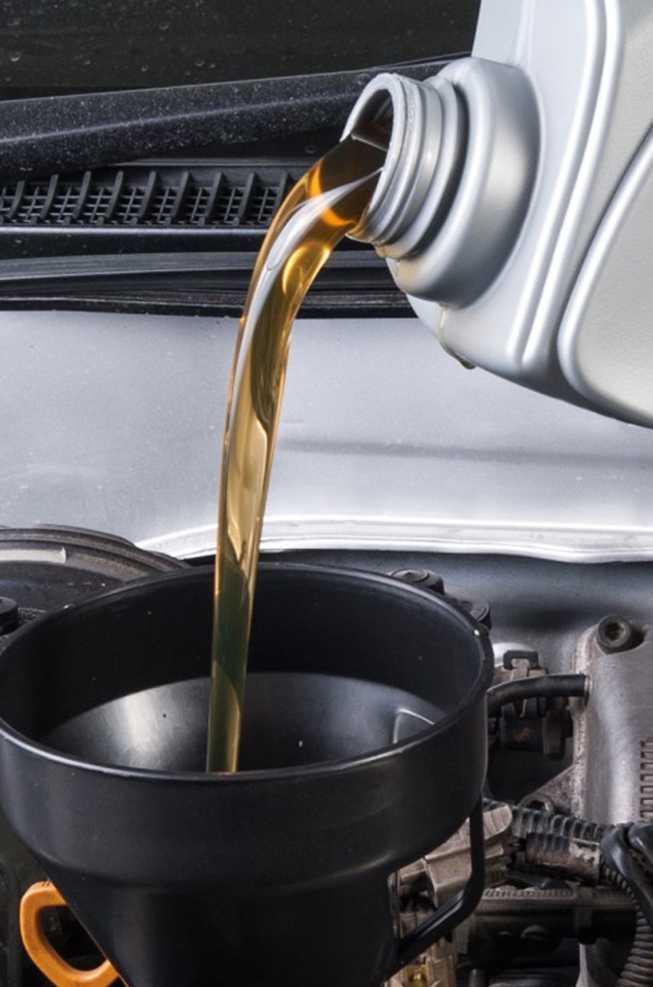 Bosch Auto Service performing a synthetic oil change on a vehicle