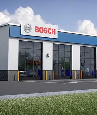 Bosch Auto Service franchise repair shop front side with vehicle bays