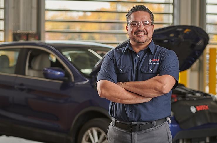 Bosch Auto Service repair technician after performing vehicle maintenance