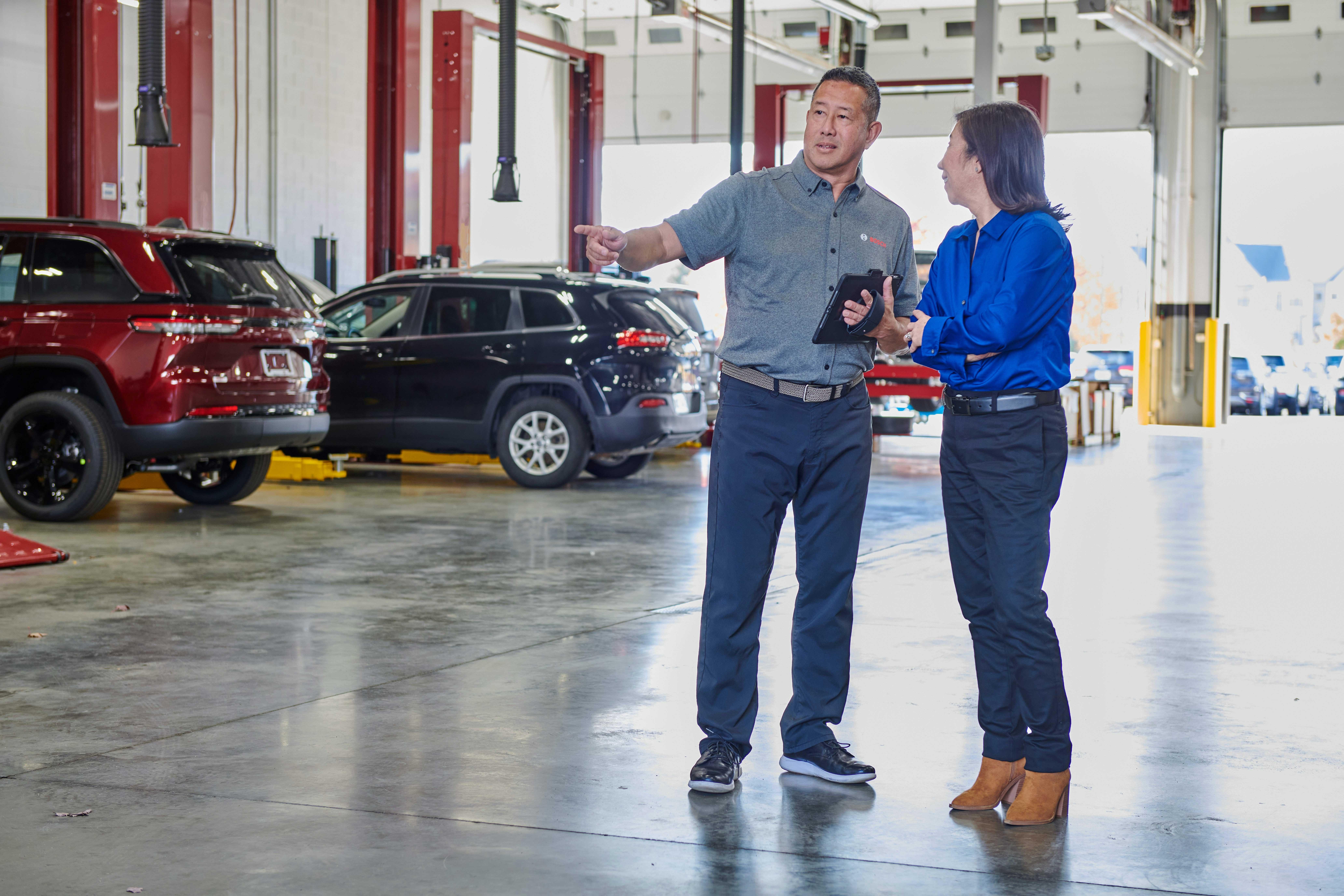 Bosch Auto Service franchise coach assessing an auto repair shop. 
