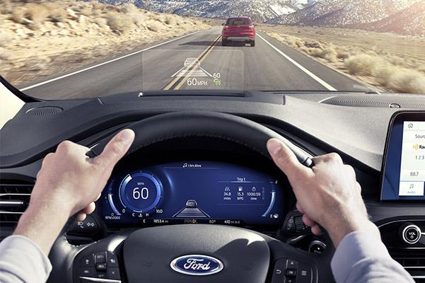 interior pilot view of Ford Escape crossover showcasing heads up diplay in the windshield